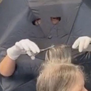 Hairdresser Cuts Holes in Umbrella to do Hair